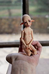 A Pocket Lou Elf